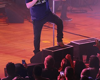 Katie Rickman | The Vindicator.Adam Duritz of Counting Crows sings to fan in the pit during a packed out show at Packard Music Hall in Warren on Saturday, Dec. 6, 2014.