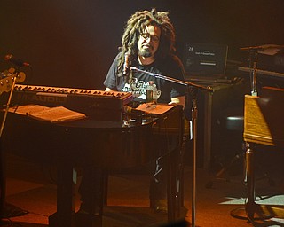 Katie Rickman | The Vindicator.Adam Duritz of Counting Crows plays piano and sings their hit "Long December" during a packed out show at Packard Music Hall in Warren on Saturday, Dec. 6, 2014.