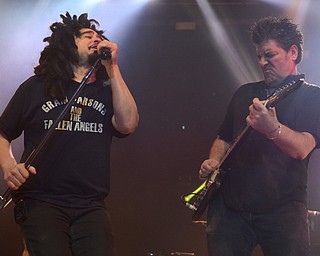 Katie Rickman | The VindicatorAdam Duritz (left) of Counting Crows and guitarist David Immerglück perform  during a packed out show at Packard Music Hall in Warren on Saturday, Dec. 6, 2014.