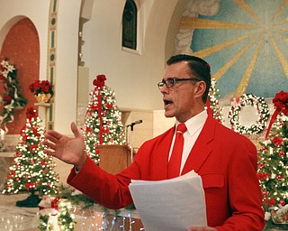 William d Lewis The vindicator  Damian Tarantino, choir director at St Casimir Church on Jefferson in youngsotwn leads singing of Polish music during a traditional Polish vigil dinner and singing Sunday 12-7-14.