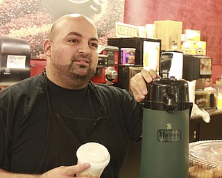 William D Lewis the Vindicator  Ehab Traish, co owner of Mocha Boca Cafe in 20 Federal Place prepares coffee.