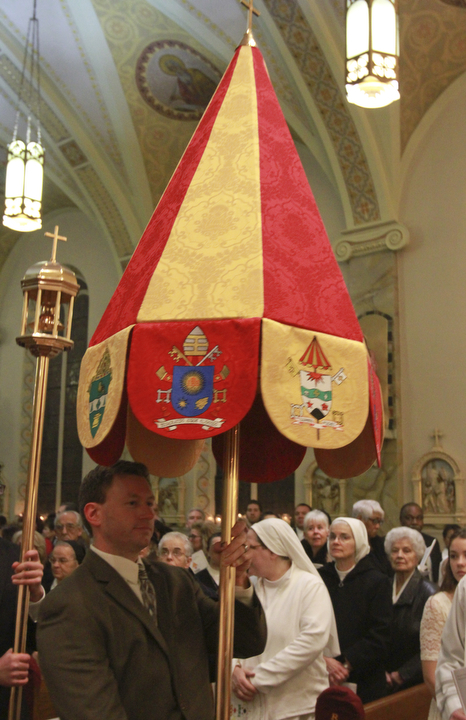 William D. Lewis the vindicator Among items in procession at MtCarmel Church for dedication mass for minor basilica was a umbraculum, SEE RELEASE