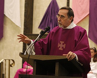 Deacon Michael Schlais preaches to the congregation at St. Stanislaus Church in Youngstowns during the 73rd annual Pearl Harbor Mass on Sunday morning.  Dustin Livesay  |  The Vindicator  12/7/14  Youngstown.