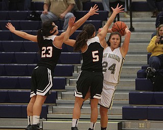 Girard's Makayla Trebella (5) and Dakota Naples (23) put pressure on Brookfield's Brooke Hiner (24) during the first half of Wednesday nights matchup at Bookfield High School. Dustin Livesay  |  The Vindicator  12/10/14  Brookfield, Ohio.