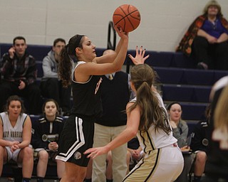 Girard's Makayla Trebella (5) puts up a shot while being defended by Brookfield's McKenzie Drapola (2) during the first half of Wednesday nights matchup at Bookfield High School. Dustin Livesay  |  The Vindicator  12/10/14  Brookfield, Ohio.