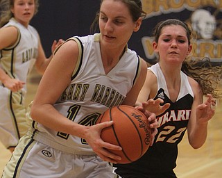 Brookfield's Destiny May (14) steals the ball off of Girard's Carlie Angelo (22) during the first half of Wednesday nights matchup at Bookfield High School. Dustin Livesay  |  The Vindicator  12/10/14  Brookfield, Ohio.
