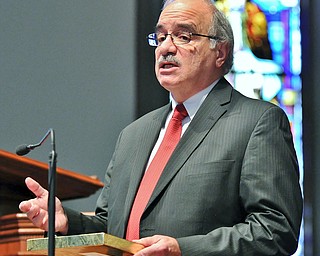 Jeff Lange | The Vindicator  Adrian Biviano of Niles speaks on behalf of the late Lucian Sam Biviano after receiving awards for his service in World War II, Monday morning at the First Presbyterian Church in Warren.