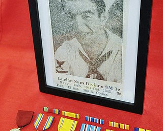 Jeff Lange | The Vindicator  Lucian Sam Biviano SM 1c served in the Navy from 1941 to 1945. He survived the attack on Pearl Harbor while serving aboard the USS Oklahoma. Boviano was honored Monday morning with 6 awards, Navy Good Conduct Medal, World War II Victory Medal, American Defense Service Medal with one Bronze Star, American Campaign Medal, Asiatic Pacific Campaign Medal with one Silver Star and one Bronze Star and one Combat Action Ribbon.