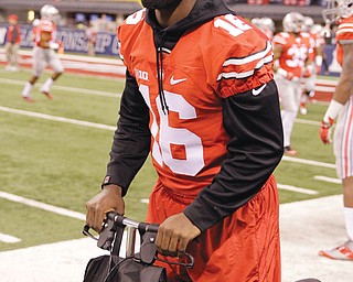 Injured Buckeyes QB J.T. Barrett watches the Big Ten title game between Ohio State and Wisconsin in Indianapolis.
Barrett and his ex-girlfriend Alexandria Barrett-Clark made 911 calls on Tuesday alleging each attacked the other.