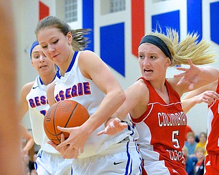 Jeff Lange | The Vindicator  Reserve's Sydney Miller (left) maintains possession of the ball as Columbiana's Baylie Mook (5) attempts to steal the ball away during first period action at Western Reserve High School, Thursday evening.