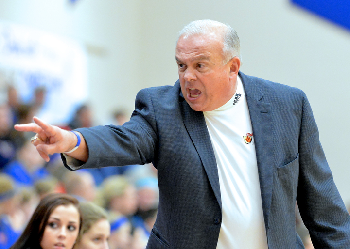 Jeff Lange | The Vindicator  Clippers' head coach Ronald Moschella calls out a player for her poor performance early in Thursday night's contest with the Blue Devils of Western Reserve.