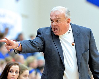 Jeff Lange | The Vindicator  Clippers' head coach Ronald Moschella calls out a player for her poor performance early in Thursday night's contest with the Blue Devils of Western Reserve.
