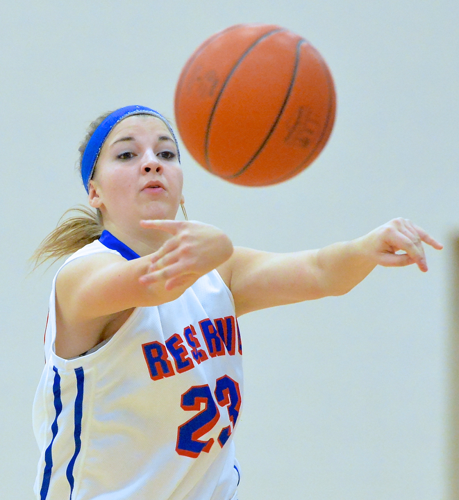 Jeff Lange | The Vindicator  Reserve's Emily Henderson makes a quick pass to a teammate in the first half of Thursday's game at Western Reserve High School.