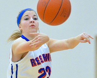 Jeff Lange | The Vindicator  Reserve's Emily Henderson makes a quick pass to a teammate in the first half of Thursday's game at Western Reserve High School.