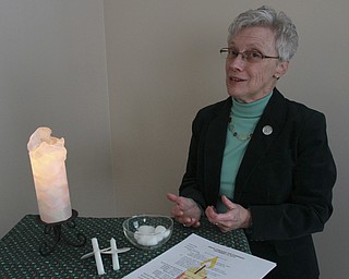William D Lewis The Vindicator  Sister Pat Fesler with items used during her Break Throught The darkness service.