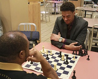 William D Lewis The Vindicator WILLIE JONES, LEFT, A VXI EMPLOYEE, AND RAY CULVER, WHO WORKS DOWNTOWN,PLAY A GAME OF CHESS IN THE FOOD COURT AT  20 Federal Place  12-9-14. THEY SAY A NUMBER OF CHESS PLAYER GATHER IN THE FOOD COURT.