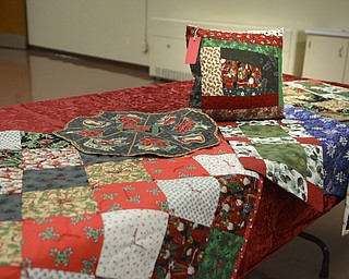 Katie Rickman | The Vindicator.Homemade quilts that will be for sale at Bethel Lutheran Church in Boardman during the cookie sale.