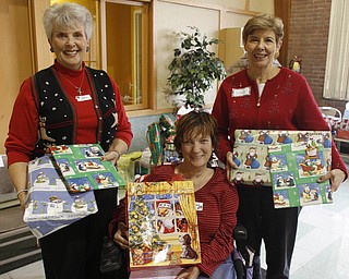        ROBERT K. YOSAY  | THE VINDICATOR..Oranizers of the event are Jan Ferry  Fran Pettit and Barb Gulgas..Churchill Methodist Church in Liberty - organizes, and wraps gifts for students at EJ Blott in Liberty . t