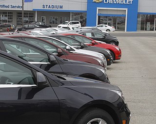        ROBERT K. YOSAY  | THE VINDICATOR..Holiday Car Deals -the chevy cruze... sits outside the Stadium Superstore in Salem