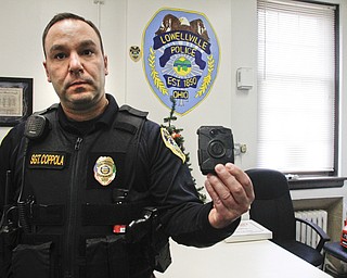        ROBERT K. YOSAY  | THE VINDICATOR. ..Police Camera... by Taser.. its a Axon Body on officer Video... worn by Sgt Don Coppola of Lowellville PD