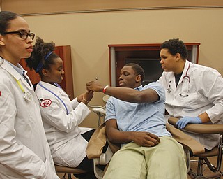        ROBERT K. YOSAY  | THE VINDICATOR..East High Schools YSUÕs Health Professions Affinity Community is an initiative to increase the diversity of the primary healthcare and dental workforce in the Mahoning Valley by encouraging high school students to prepare for careers in health professions.