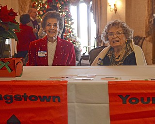 Katie Rickman | The Vindicator.Mary Harper, on left, of Canfield and Mary Lou Green of Canfield welcome people to  the Annual Youngstown Sheet and Tube Luncheon at the Tippecanoe Country Club in Canfield on Friday, Dec. 12, 2014.