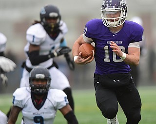 ALLIANCE, OHIO - DECEMBER 13, 2014: Kevin Burke #10 of Mount Union runs the football in open space after sprinting pas Aamir Petrose #9 and Sosthene Kapepula #1 of Wesley during the 1st half of Saturday afternoons game at Mount Union Stadium. Mount Union won 70-21. (photo by David Dermer/Youngstown Vindicator)