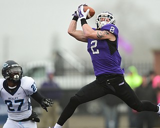 ALLIANCE, OHIO - DECEMBER 13, 2014: Luc Meacham #2 of Mount Union catches a pass in the end zone for a touchdown in front of Leroy Cheatham #27 of Weasley during the 1st half of Saturday afternoons game at Mount Union Stadium. Mount Union won 70-21. (photo by David Dermer/Youngstown Vindicator)