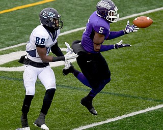 ALLIANCE, OHIO - DECEMBER 13, 2014: Tre Jones #5 of Mount Union intercepts a pass intended for Steve Koudossou #88 of Wesley during the 1st half of Saturday afternoons game at Mount Union Stadium. Mount Union won 70-21. (photo by David Dermer/Youngstown Vindicator) This would be returned for a 85 yard touchdown.