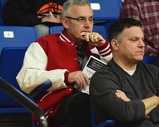 POLAND, OHIO - DECEMBER 13, 2014: YSU president Jim Tressel watches a game between Fitch and Girard Saturday afternoon at Poland High School. (Photo by David Dermer/Youngstown Vindicator)
