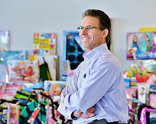 Jeff Lange | The Vindicator  GM Plant Manager Steve Notar Donato smiles as he speaks about the money and toys raised by the UAW members, Tuesday afternoon at the Lordstown GM Complex Paint Shop.
