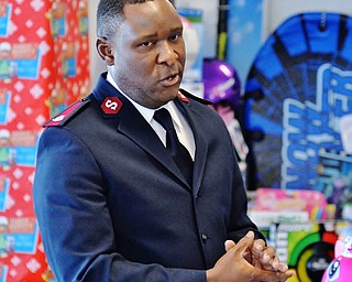 Jeff Lange | The Vindicator  Maj. Elijah Kahn of the Salvation Army talks about the toys raised by the UAW members, Tuesday afternoon at the GM Plant in Lordstown.