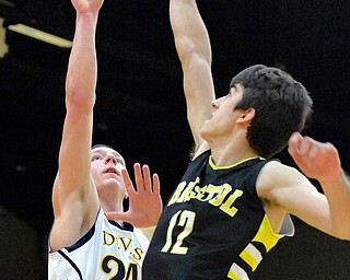 Jeff Lange | The Vindicator  McDonald's Brad Woodley (24) has his shot blocked by Bristol's Jaime de Lope (12) in the first quarter of Saturday night's game in Struthers as part of the Hope Classic Showcase.