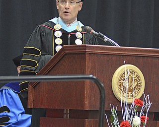 Katie Rickman | The Vindicator.Jim Tressel, President of YSU speaks during the commencement ceremony at Youngstown State University on Sunday, Dec. 14, 2014 at the Beeghly Center.