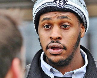 Jeff Lange | The Vindicator  Protest organizer Rodrick Lewis of Warren tells media his reasoning behind leading Saturday's peaceful protest in Warren.