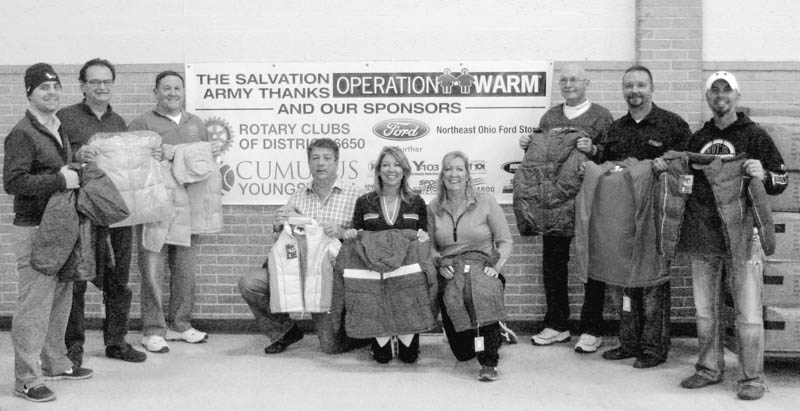 SPECIAL TO THE VINDICATOR: Local Rotary clubs gathered to distribute new coats to children on Dec. 6 at Salvation Army on Glenwood Avenue. The Rotary clubs of Austintown, Boardman, Canfield, Poland, Struthers and Youngstown sponsored the event. Above are Rotary members who helped distribute the coats. From left to right are Robert McFarland, Ron Carroll and Gary Reel from Austintown Rotary; Sam Boak, Donna Boak and Nancy Ramunno from Canfield Rotary; Chuck Cole and Mark Cole from Austintown Rotary; and Tom Fusco from Canfield Rotary.