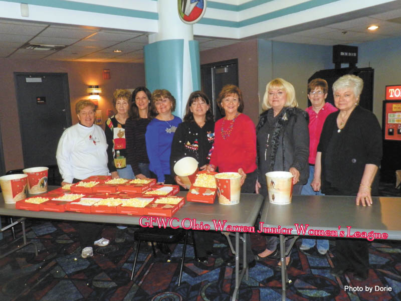 SPECIAL TO THE VINDICATOR: General Federation of Women’s Clubs Ohio Warren Junior Women’s League showed its volunteer spirit recently by hosting Movie Day for 300 clients and families from Fairhaven School for Developmental Disabilities and from Life Experiences Activities Program. Santa Claus greeted the movie-goers. Warren Junior Women’s League members, from left, are Dorothy Sideropolis-Keriotis; Edwina Wolcott; Kelly Kelly; Cheryl Zurawick; Renee Maiorca, WJWL president; Carmella Neilson; Esther Gartland; Patty Padovani, home life chairman; and Linda Tiihonen, Fairhaven Foundation director.