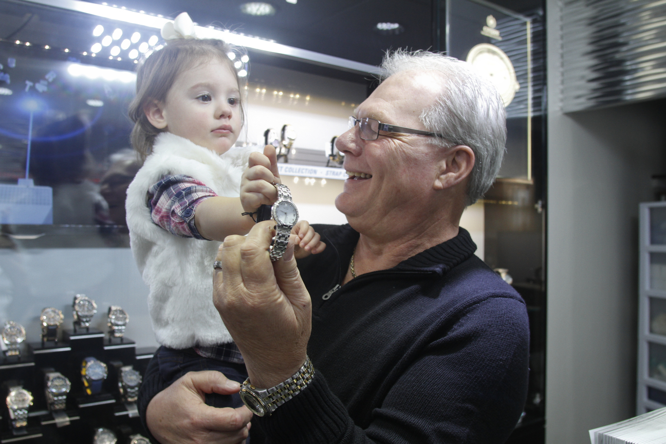        ROBERT K. YOSAY  | THE VINDICATOR..Mark   Cichanski  holds the fourth generation of Jewelers   Olivia 1 1/2  latest addition -  and most popular his Citizen band of Watches..(ladies diamond citizen)..Cirelli Jewelers.. Boardman