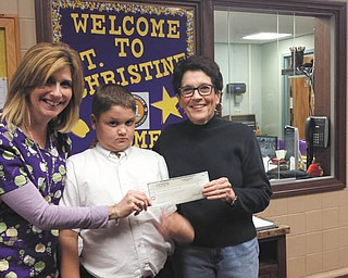 SPECIAL TO THE VINDICATOR: Fifth-grade student Konnor Patris takes diabetes awareness to the classroom. Patris helped organize a dress down at St. Christine School on Nov. 14. The event raised $328. Half will go to the Diabetes Partnership of Mahoning Valley and the other half to Juvenile Diabetes Research.  Patris and school nurse Suzie Cavalier demonstrated how his insulin pod delivers regular injections and explained the process of testing his blood sugar. Showing off the results, from left, are Cavalier, Patris and Marguerite Hassay, right, advocate and board member of the Diabetes Partnership.