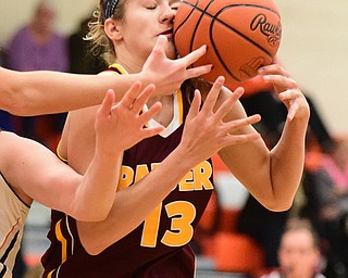 NEW MIDDLETOWN, OHIO - DECEMBER 15, 2014: Madison Durkin #13 of South Range has a loose ball hit her in the face while she tries to grab a rebound during the 1st half of Monday nights game at Springfield High School. (Photo by David Dermer/Youngstown Vindicator)