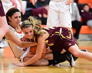 NEW MIDDLETOWN, OHIO - DECEMBER 15, 2014:Morgan Czopur #20 South Range and Valerie Kinsey #32 of Springfield battle for a loose ball during the 1st half of Monday nights game at Springfield High School. (Photo by David Dermer/Youngstown Vindicator)