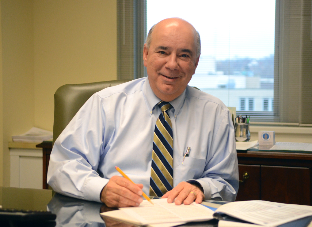 Katie Rickman | The VindicatorFrank Hierro is the new Mahoning Valley Regional President with Home Savings bank, he poses for a photo in his office Tuesday, Dec. 16, 2014.