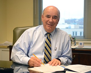 Katie Rickman | The VindicatorFrank Hierro is the new Mahoning Valley Regional President with Home Savings bank, he poses for a photo in his office Tuesday, Dec. 16, 2014.