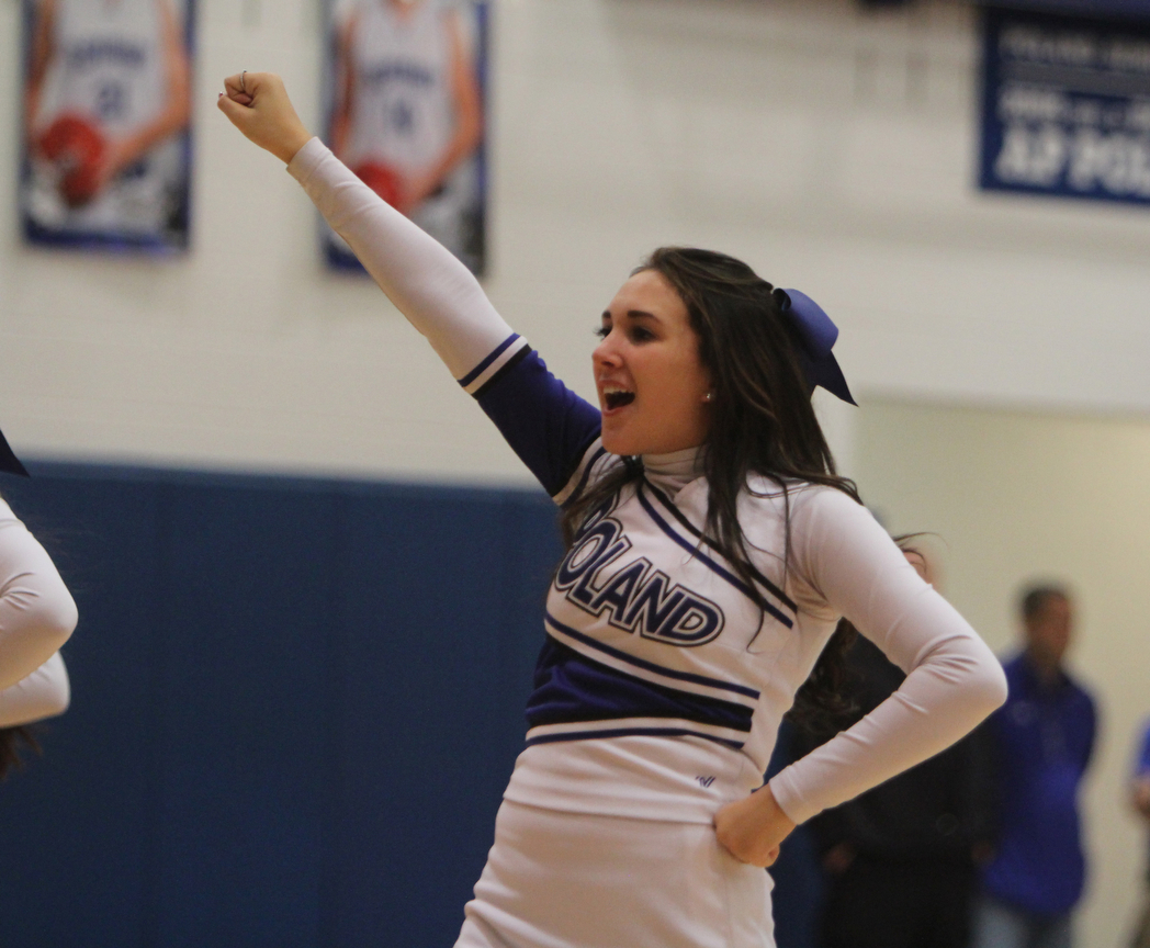 Anne Marie Ginnis of the Poland cheerleading squad cheer during a timeout during the second half of Friday nights matchup against Boardman High School at Poland Seminary High School. Dustin Livesay  |  The Vindicator  12/19/14  Poland Seminary High School.