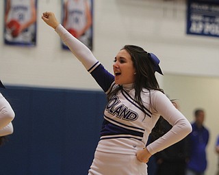 Anne Marie Ginnis of the Poland cheerleading squad cheer during a timeout during the second half of Friday nights matchup against Boardman High School at Poland Seminary High School. Dustin Livesay  |  The Vindicator  12/19/14  Poland Seminary High School.