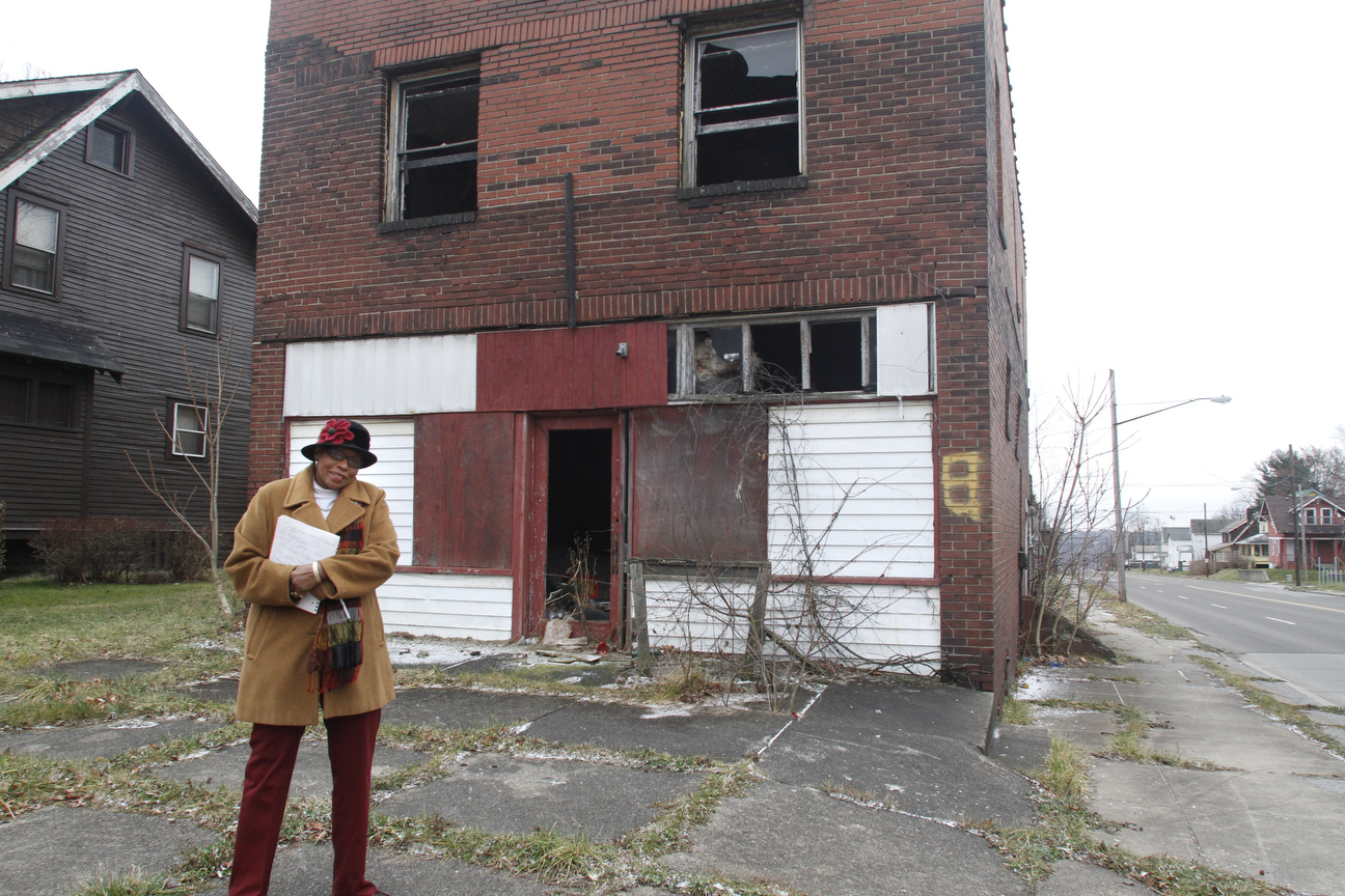        ROBERT K. YOSAY  | THE VINDICATOR..Coney is a longtime advocate for demolishing vacant and dangerous houses in her neighborhood. SheÕs met with a great deal of success over the years and is targeting another house on the corner of Wirt and Delaware. ....-30-