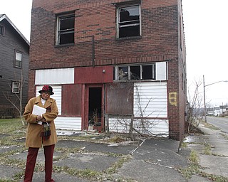        ROBERT K. YOSAY  | THE VINDICATOR..Coney is a longtime advocate for demolishing vacant and dangerous houses in her neighborhood. SheÕs met with a great deal of success over the years and is targeting another house on the corner of Wirt and Delaware. ....-30-