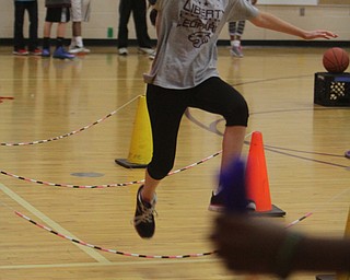 Lalya Esmail runs through an obstacle course during Wllness Day at the W.S. Guy Middle School in Liberty on Wednesday morning.  Dustin Livesay  |  The Vindicator  12/17/14  Liberty.