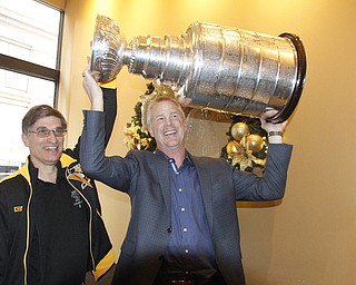        ROBERT K. YOSAY  | THE VINDICATOR..The Stanley Cup will be on display for photos in connection to its display at Friday night’s Phantoms game.Troy Loney points to the TWO rings he won and his name on the cup Twice.-30-