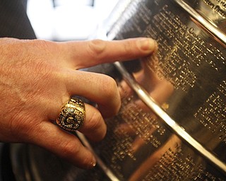        ROBERT K. YOSAY  | THE VINDICATOR..The Stanley Cup will be on display for photos in connection to its display at Friday night’s Phantoms game.Loney with THE RING..  reads off some of the team mates names.. he played with .-30-